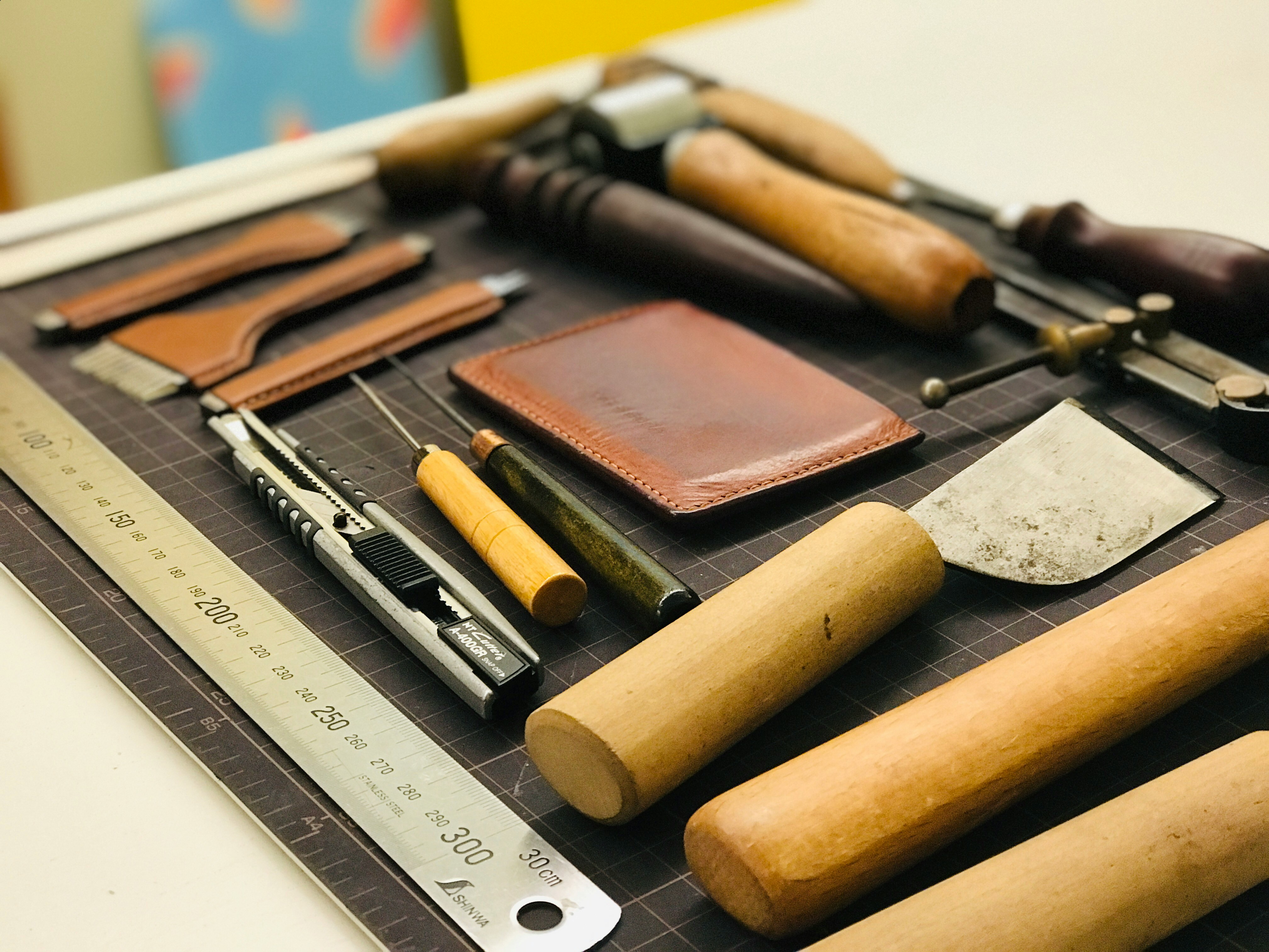 Preparing leather at the cutting bench
